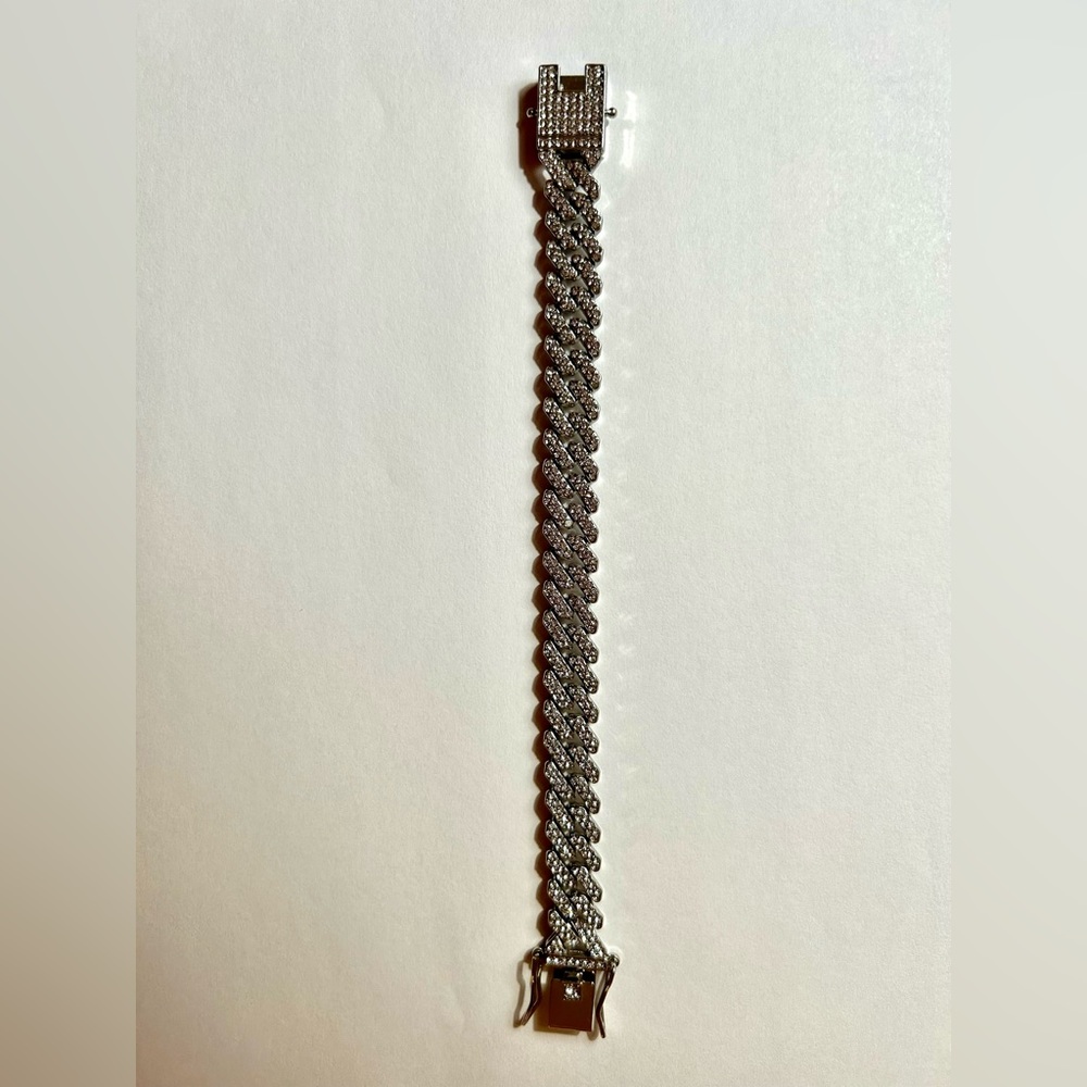 Men’s or Women’s silver bracelet. Never worn. No tags. Clasp closure.